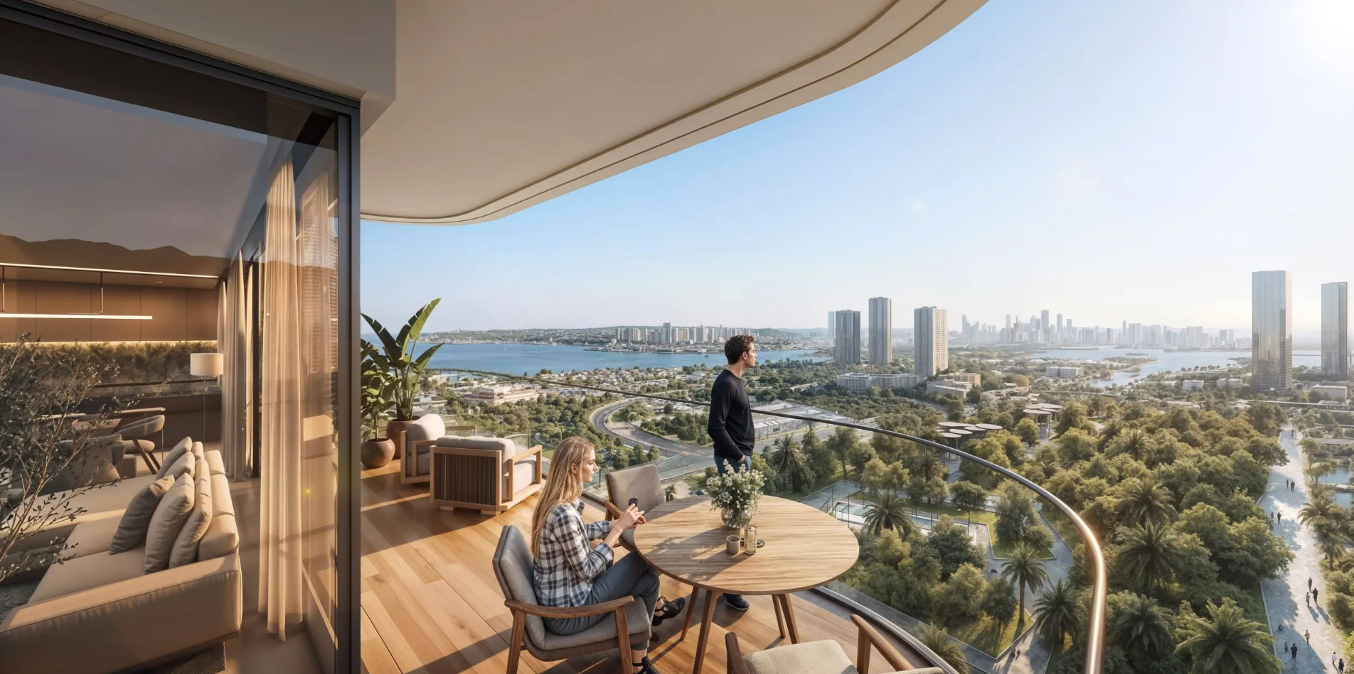 Exterior waterfront view of Beach Rotana Residences towers along the Arabian Gulf in downtown Abu Dhabi luxury real estate.