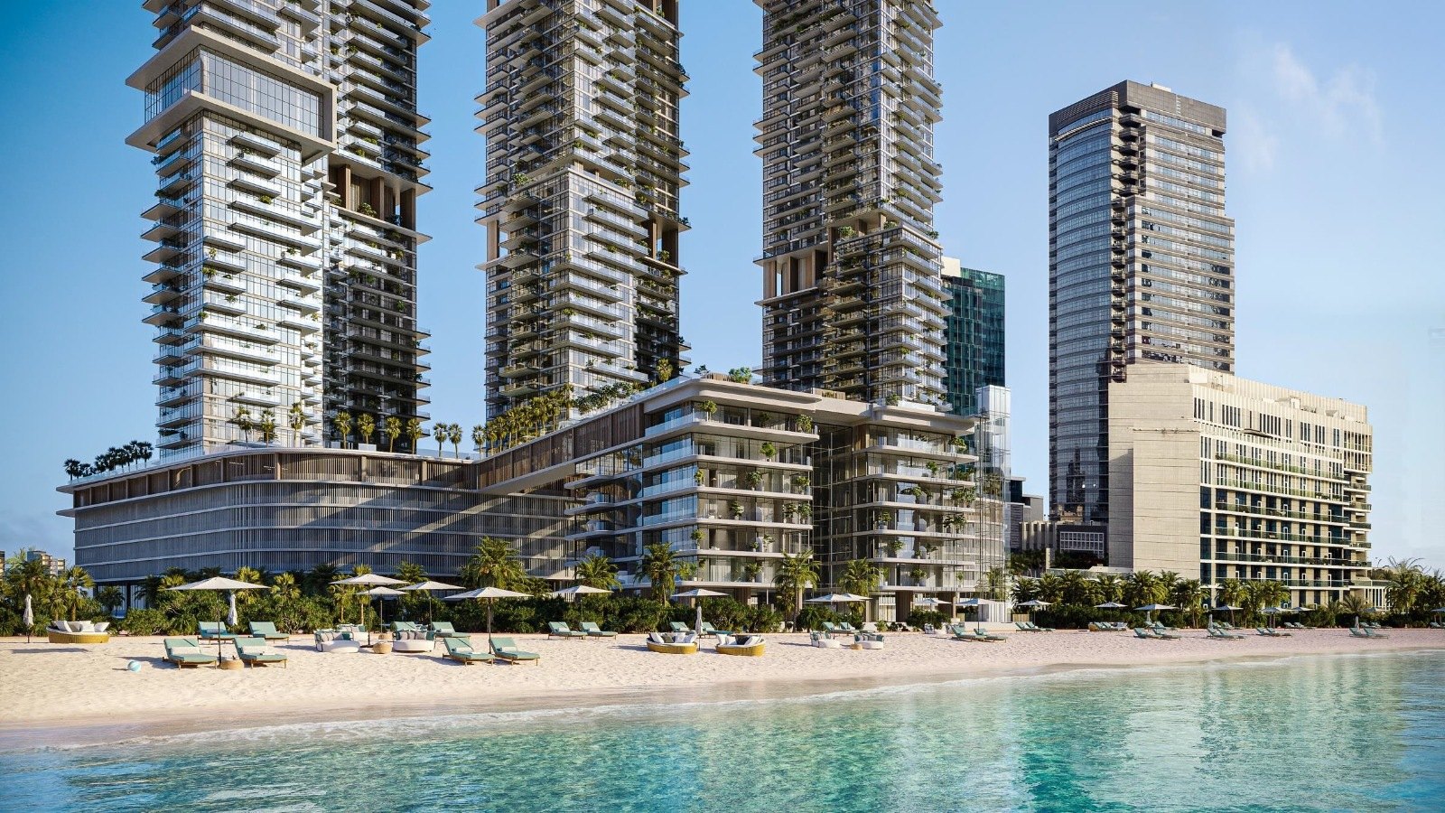 Beachfront exterior of Bab Al Qasr Beach Resort Residence 77 Reem Island Abu Dhabi showing branded towers above white sand