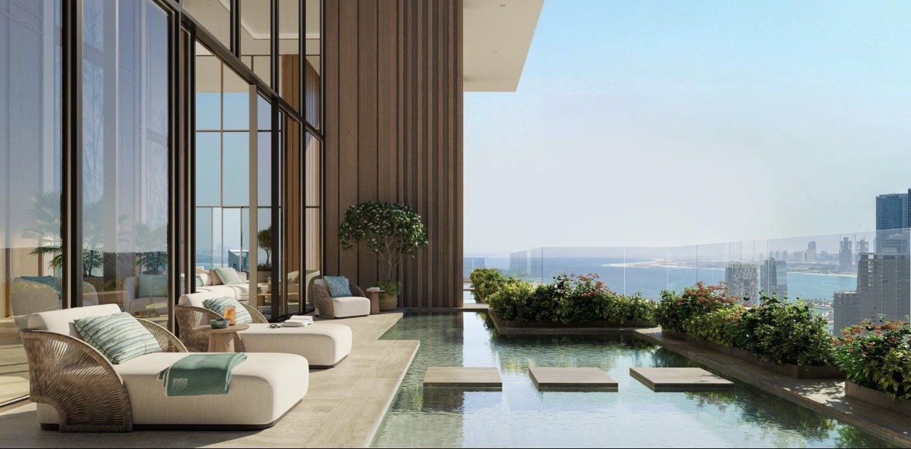Sea view terrace at Bab Al Qasr Beach Resort Residence 77 Reem Island Abu Dhabi with outdoor seating and palms