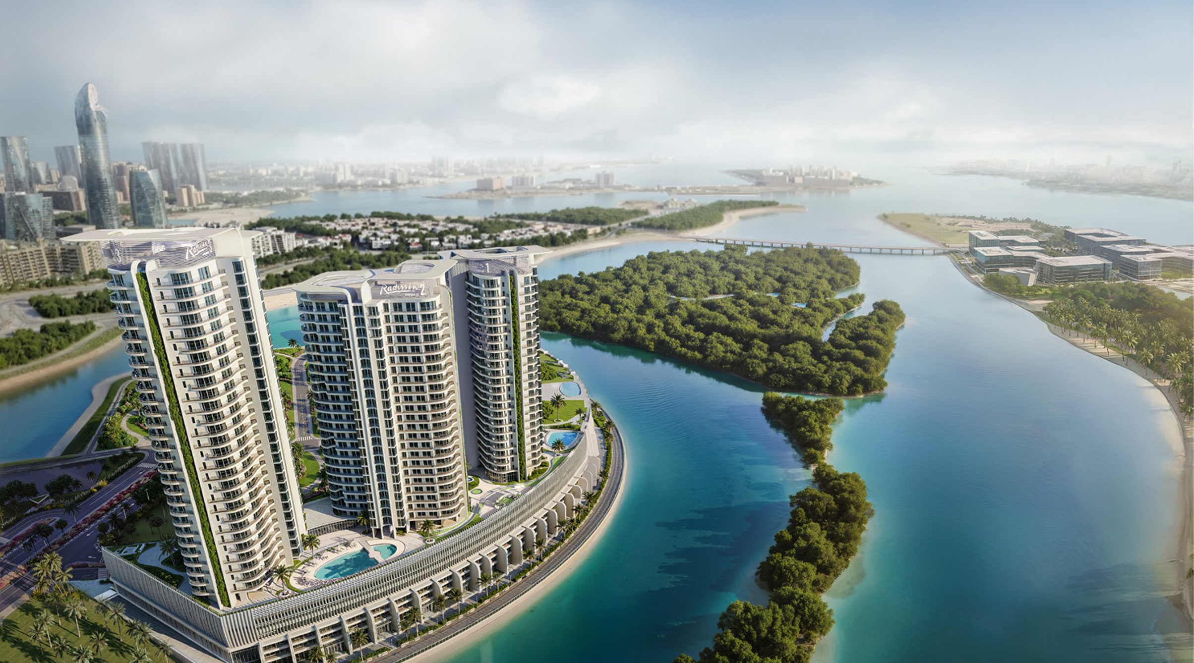 Bird’s-eye view of Radisson Residences Al Reem Island Abu Dhabi towers overlooking mangroves and Abu Dhabi skyline