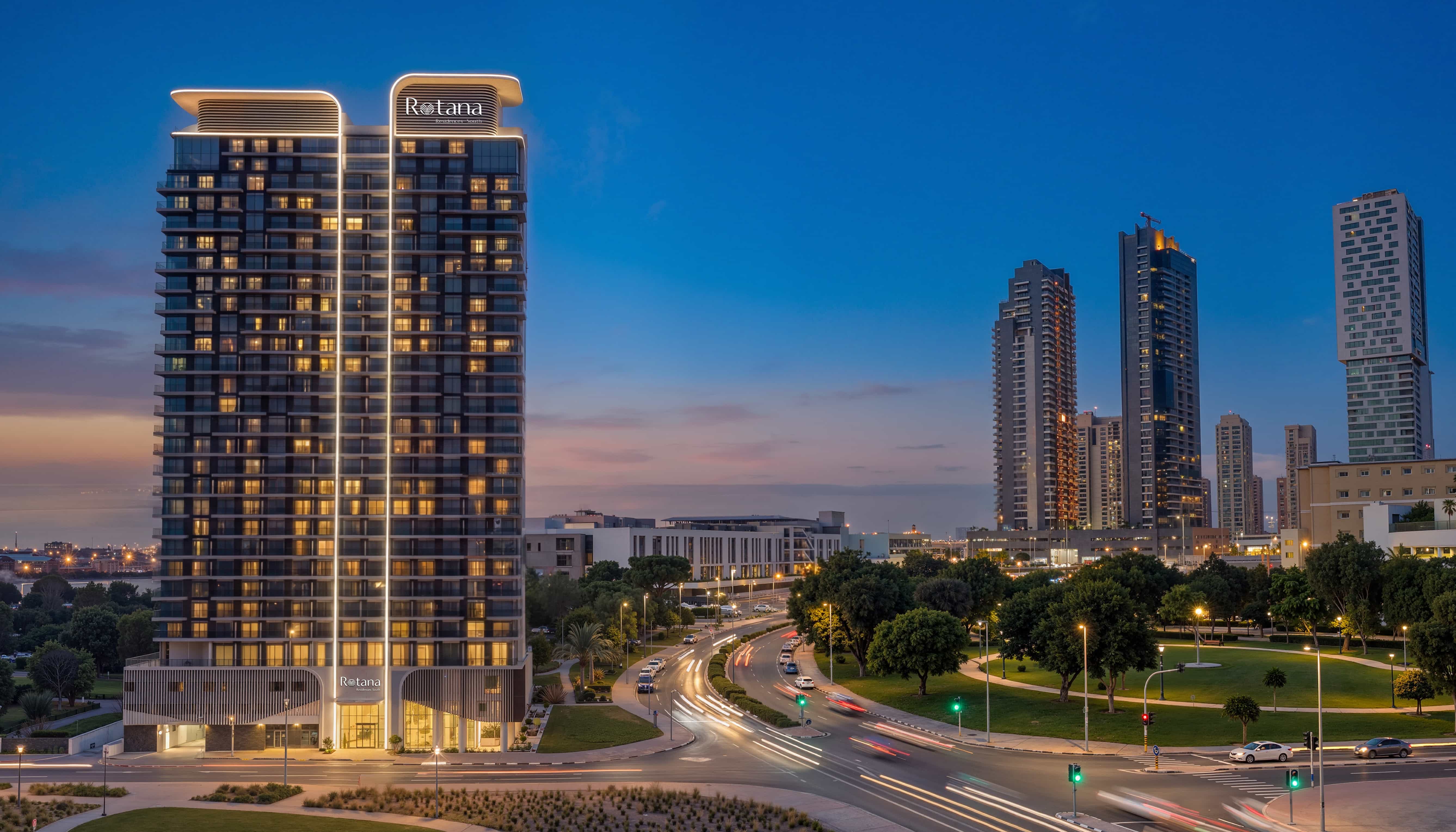 Podium‑level exterior of Rotana Residences Al Reem Island, Abu Dhabi, UAE showcasing landscaped walkways, community‑friendly design, and premium outdoor spaces
