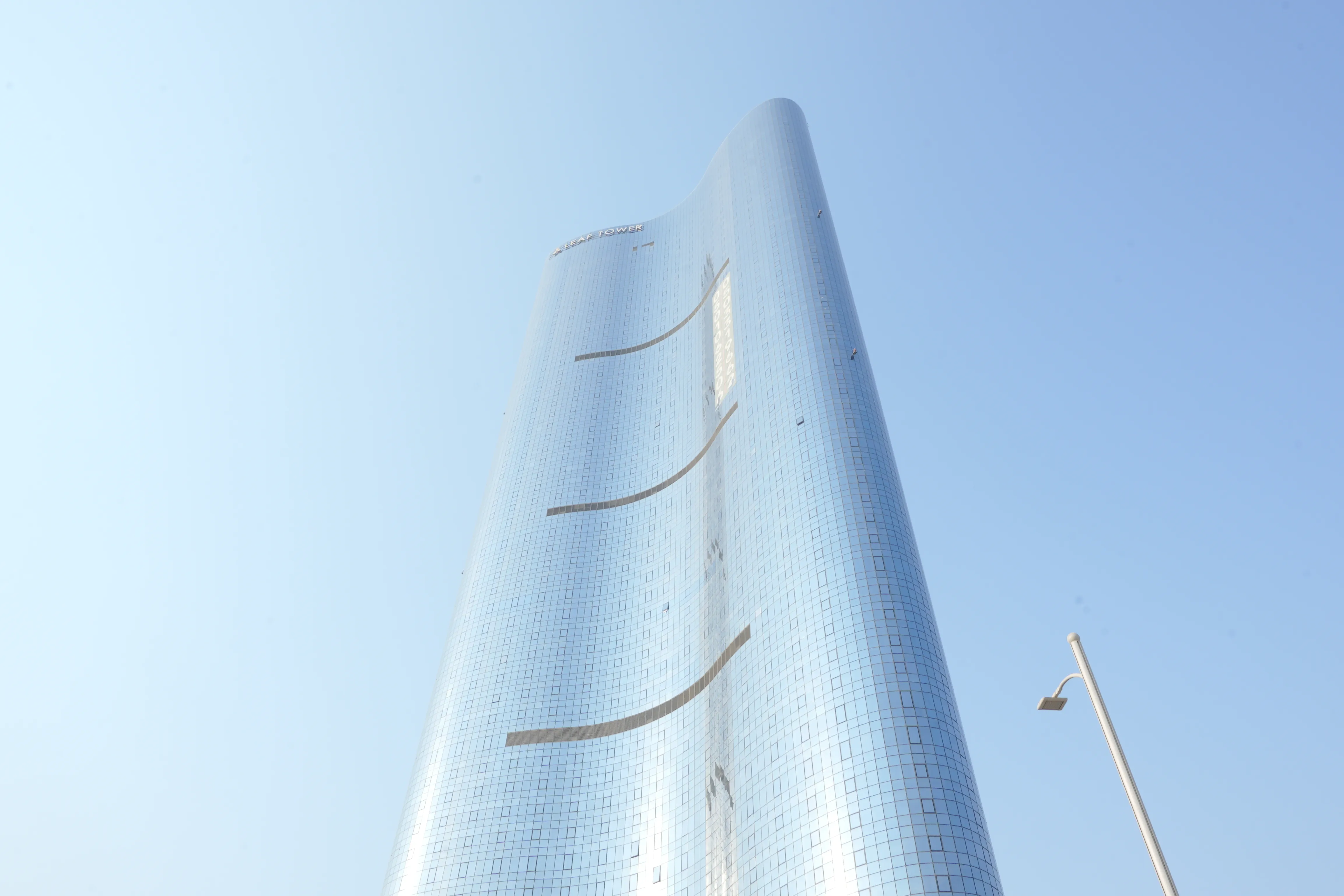 Luxury residential exterior of Leaf Tower offering contemporary living in Abu Dhabi.