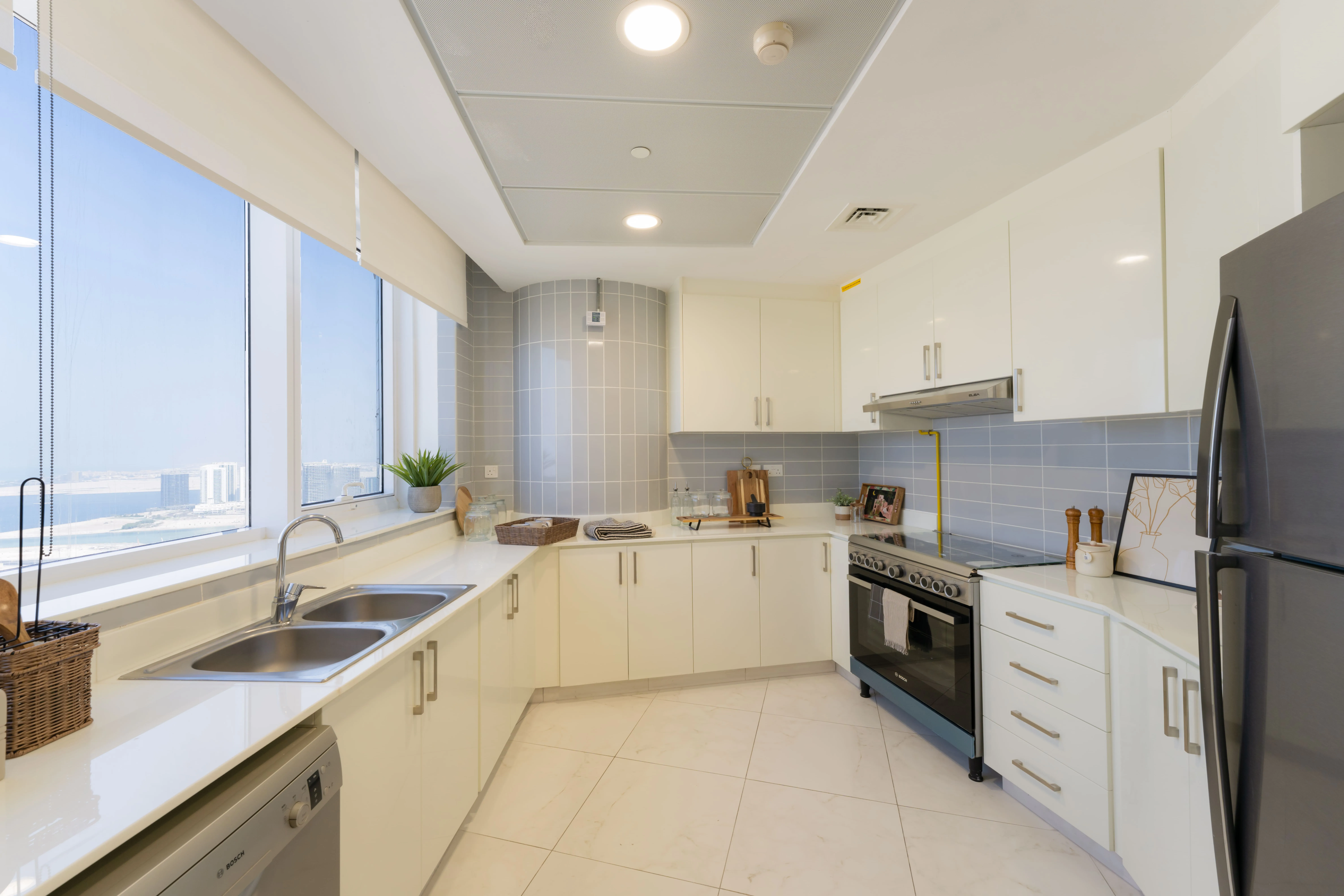 Fully fitted modern kitchen in Leaf Tower apartments with functional design.