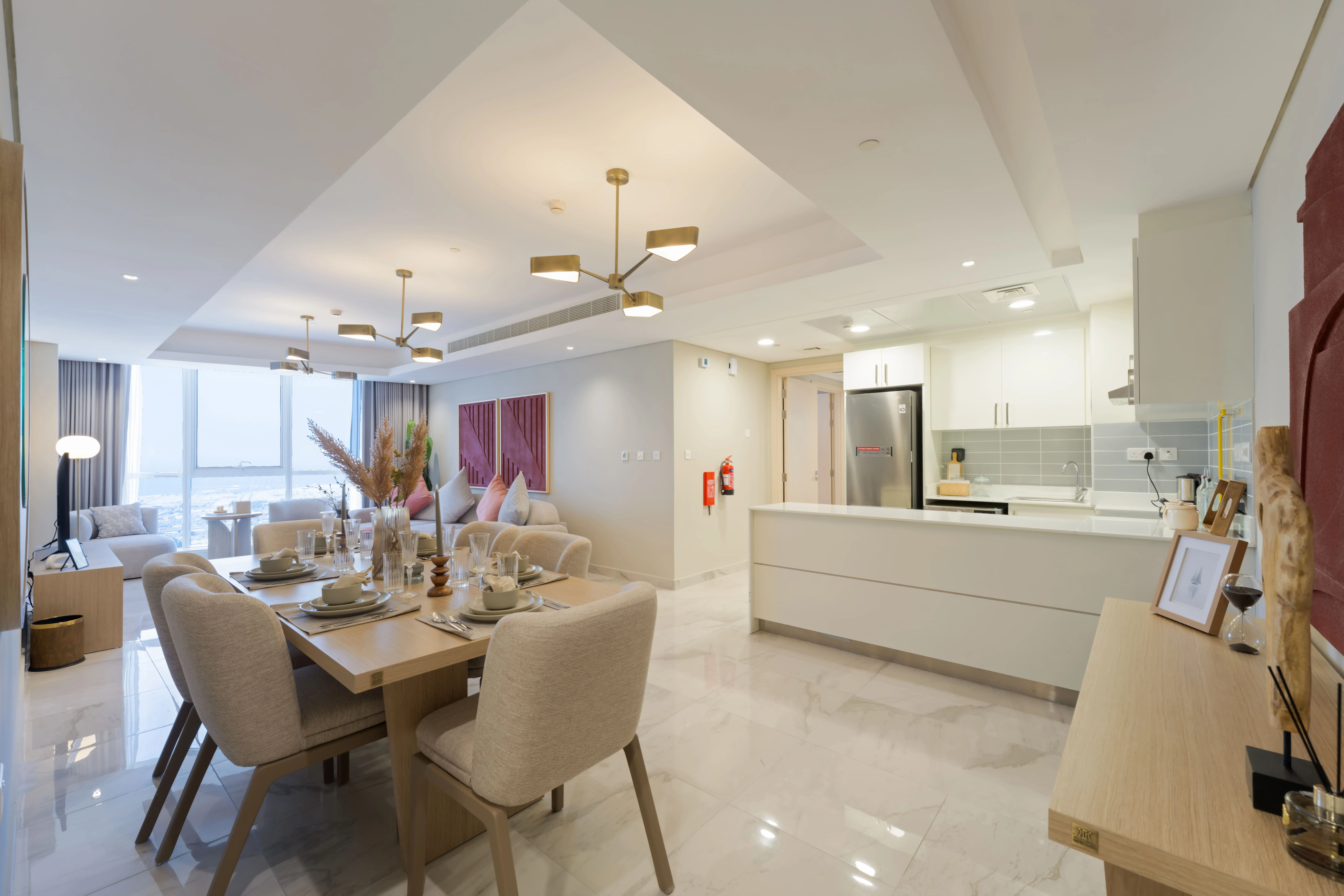 Open-plan living and dining space at Leaf Tower with contemporary residential interiors.