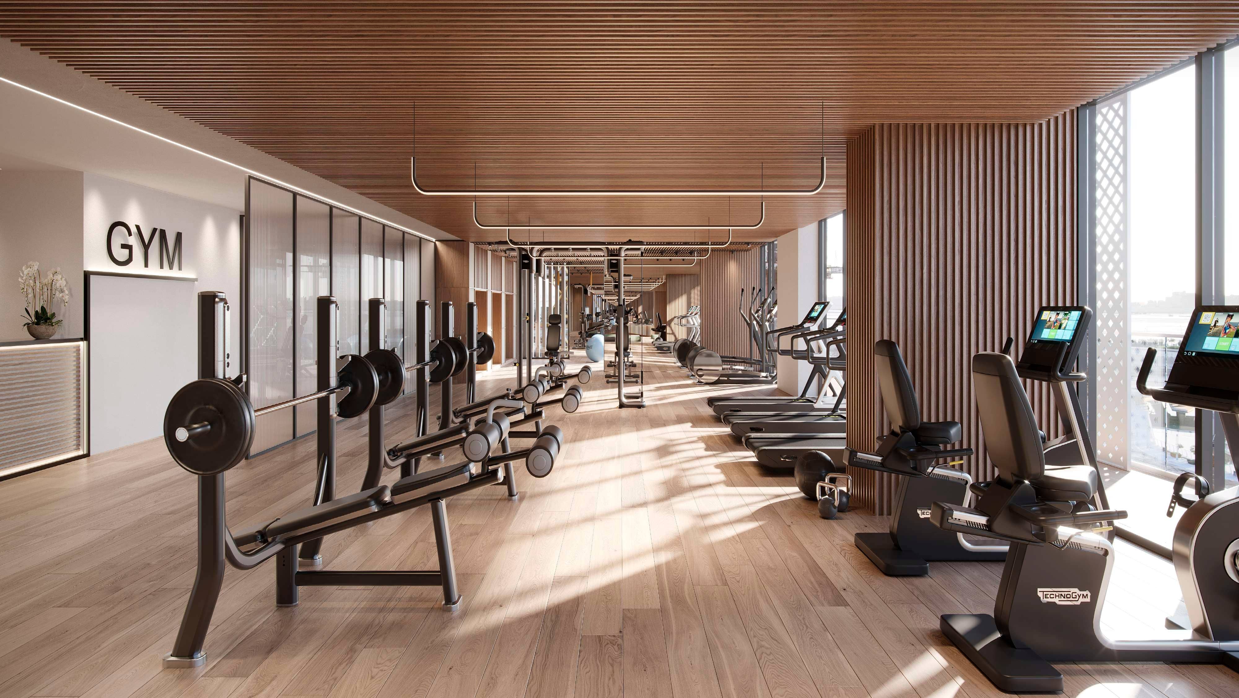 Gym Luxurious master bedroom at Reem Eleven with soft tones, elegant textures, and expansive windows for a serene retreat.