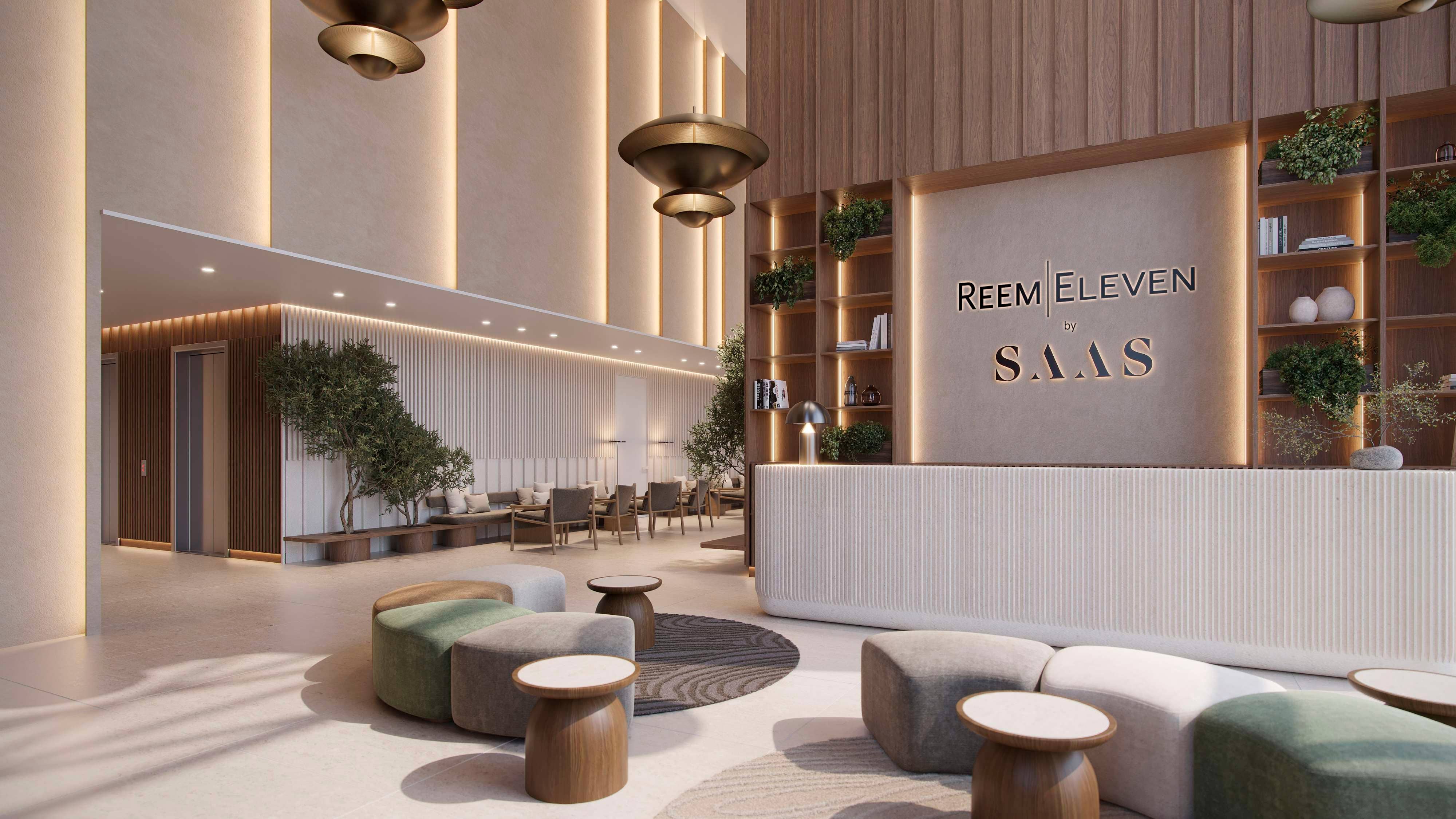 Open Kitchen Interior — Modern equipped kitchen at Reem Eleven showcasing sleek cabinetry, built‑in appliances, and high‑quality finishes.