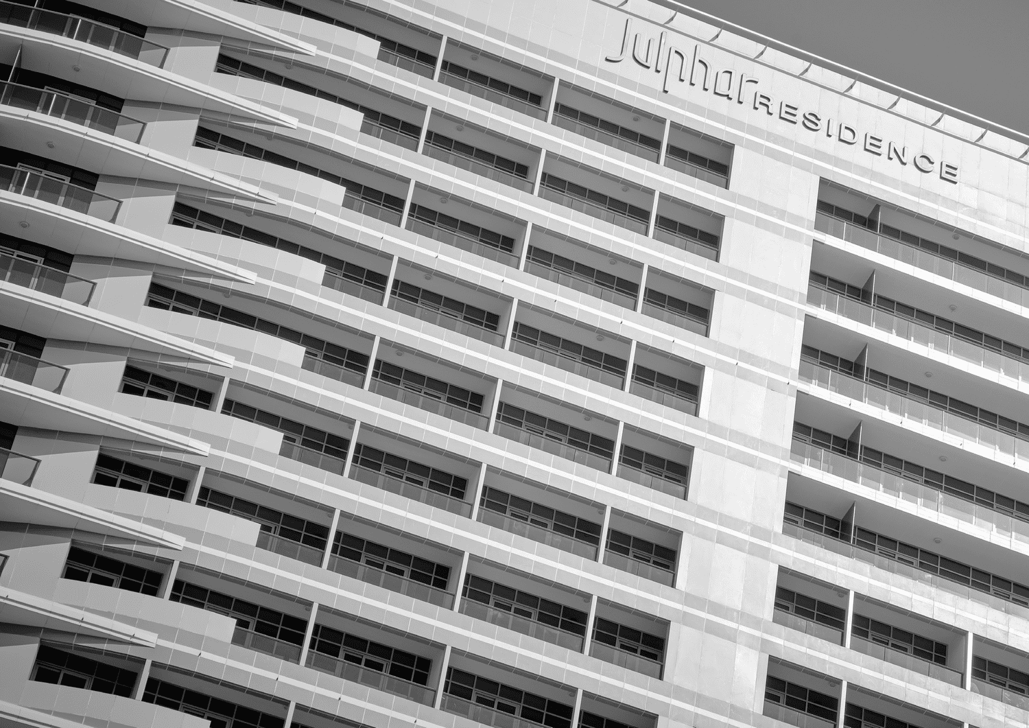 Modern façade of Julphar Residence featuring elegant residential design on Al Reem Island.