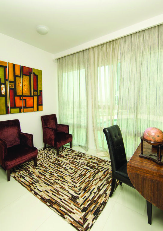 Elegant dining and living space inside Horizon Towers waterfront apartments.