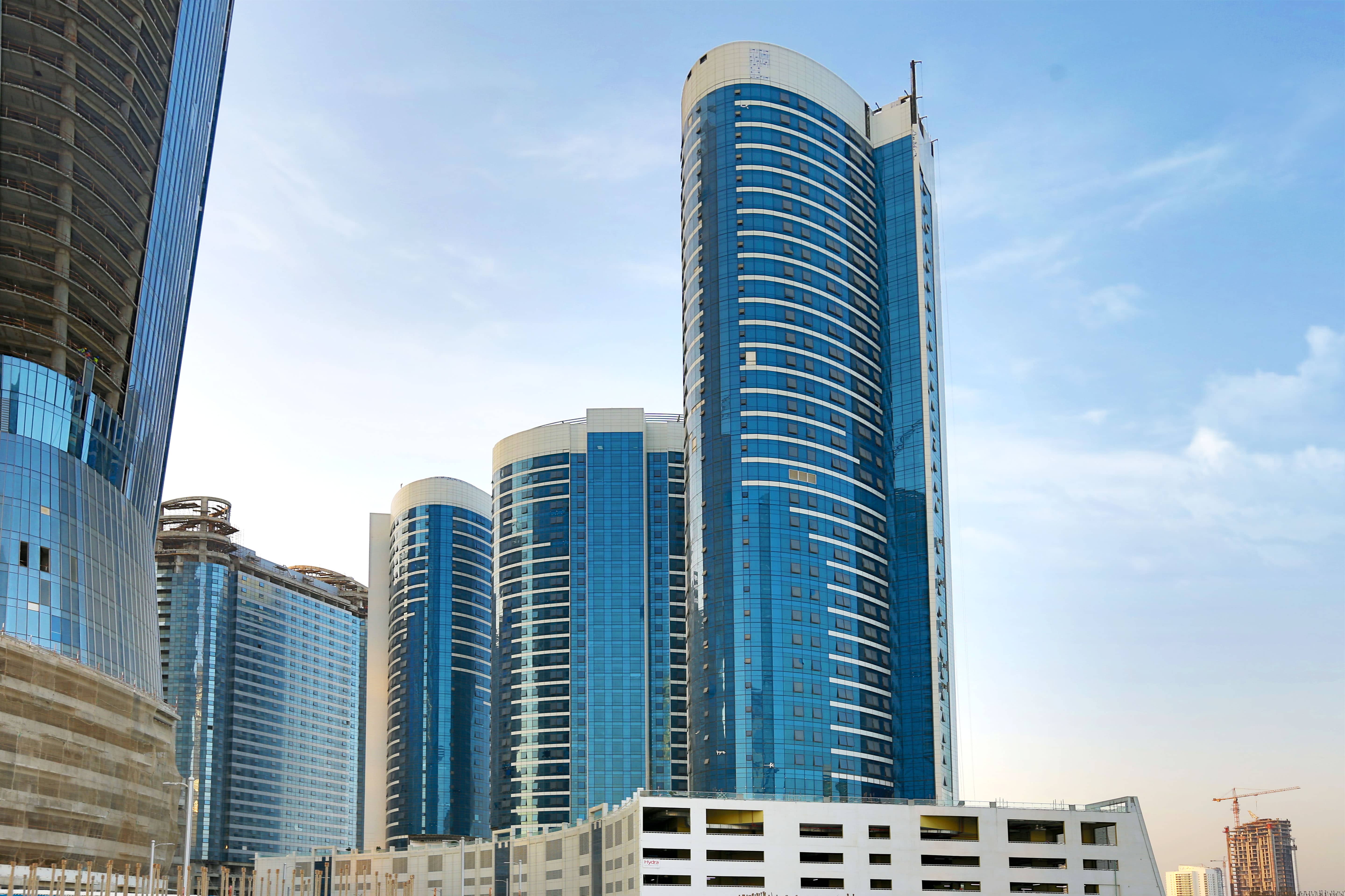 Modern exterior view of Hydra Avenue Abu Dhabi featuring premium apartment towers in the City of Lights