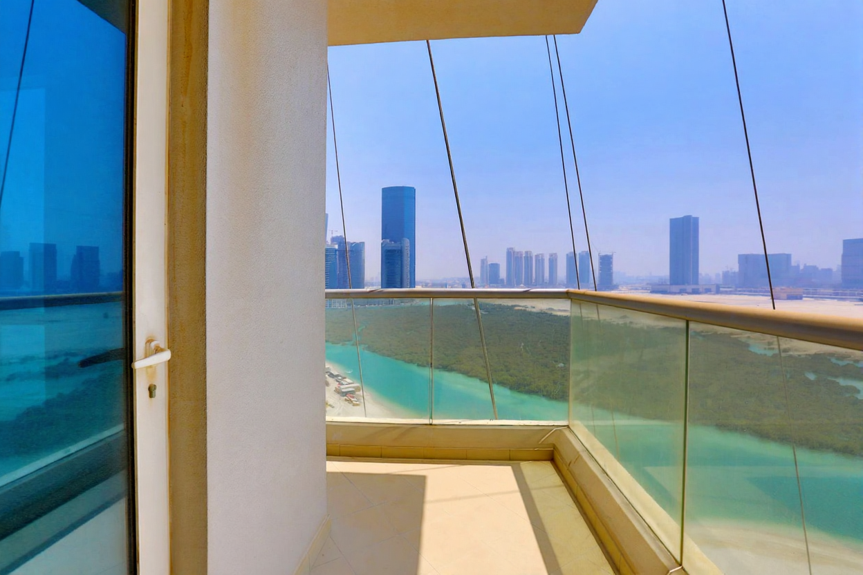 Oceanscape by Damac exterior facade detail on Al Reem Island, Abu Dhabi, highlighting aluminium-framed glazing and balcony designs