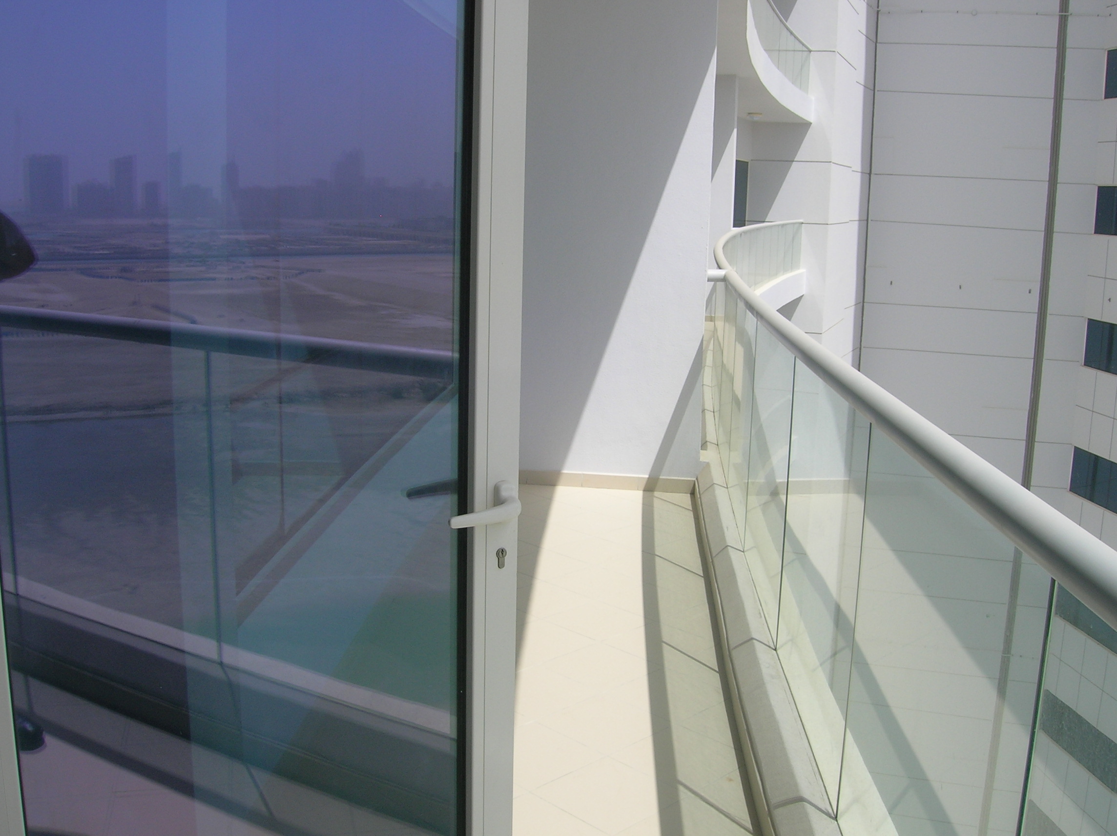 Oceanscape by Damac exterior view of the waterfront promenade on Al Reem Island, Abu Dhabi, overlooking the mangroves and sea