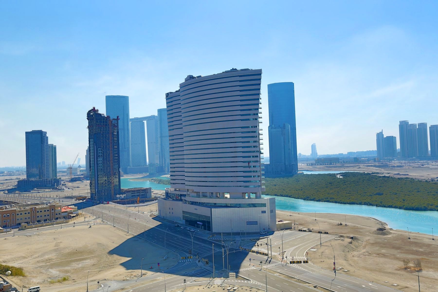 Oceanscape by Damac waterfront tower exterior view from Al Reem Island, Abu Dhabi, highlighting the sea-facing residential skyline
