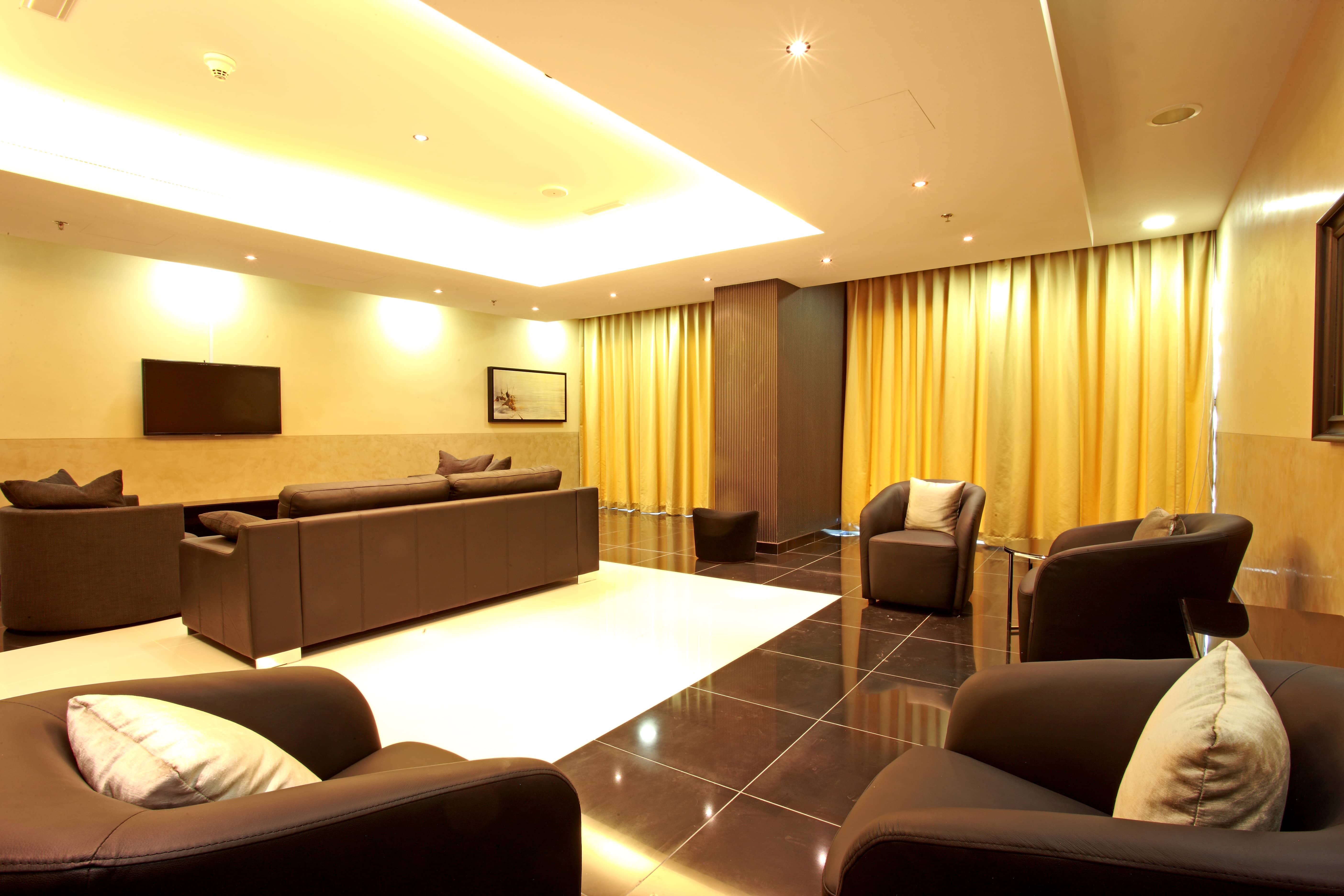 Marina Bay Al Reem Island apartment interior featuring bright open-plan living spaces with quality finishes in Abu Dhabi.