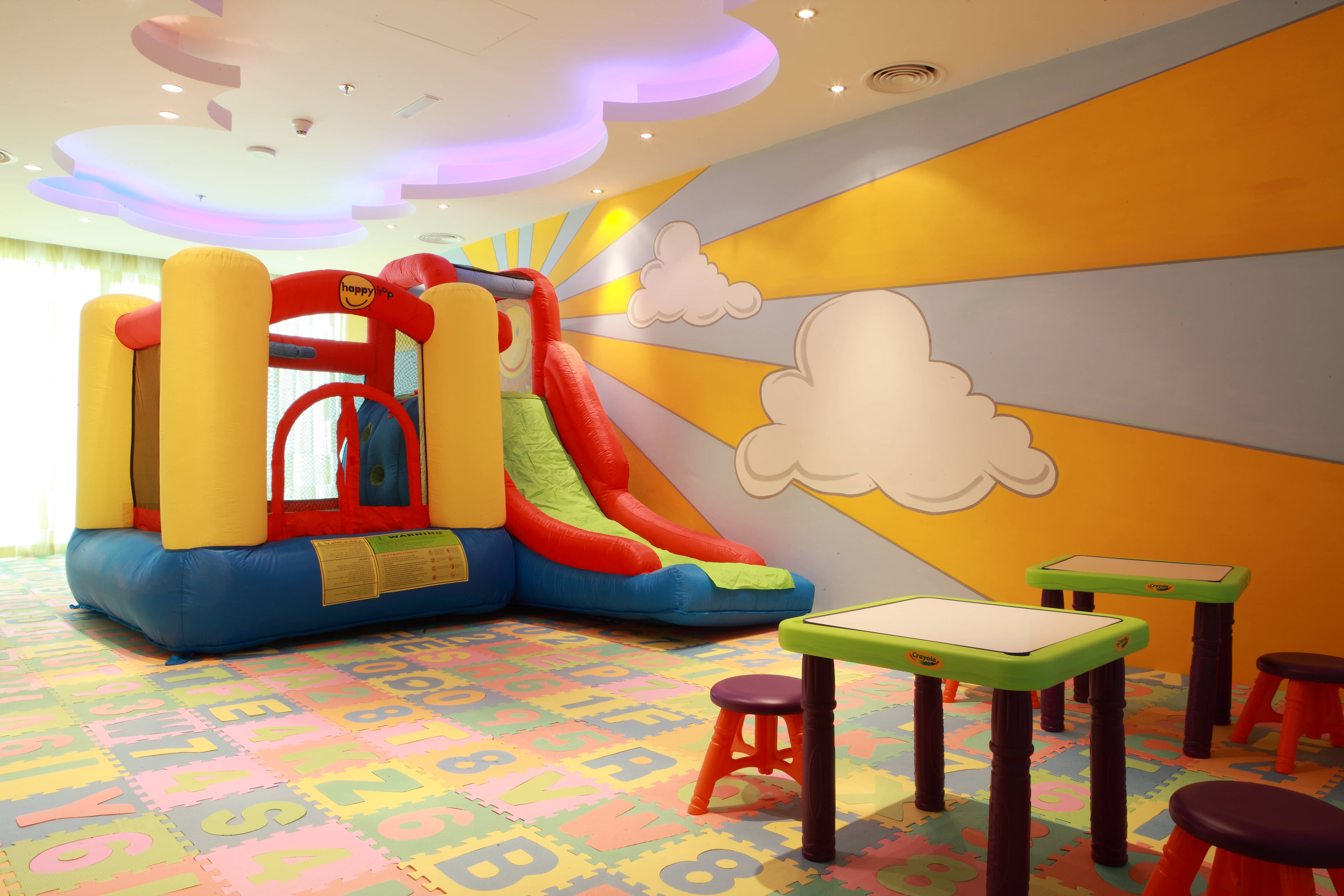 Marina Bay kids play area on Al Reem Island Abu Dhabi featuring safe indoor recreational space for children and families.