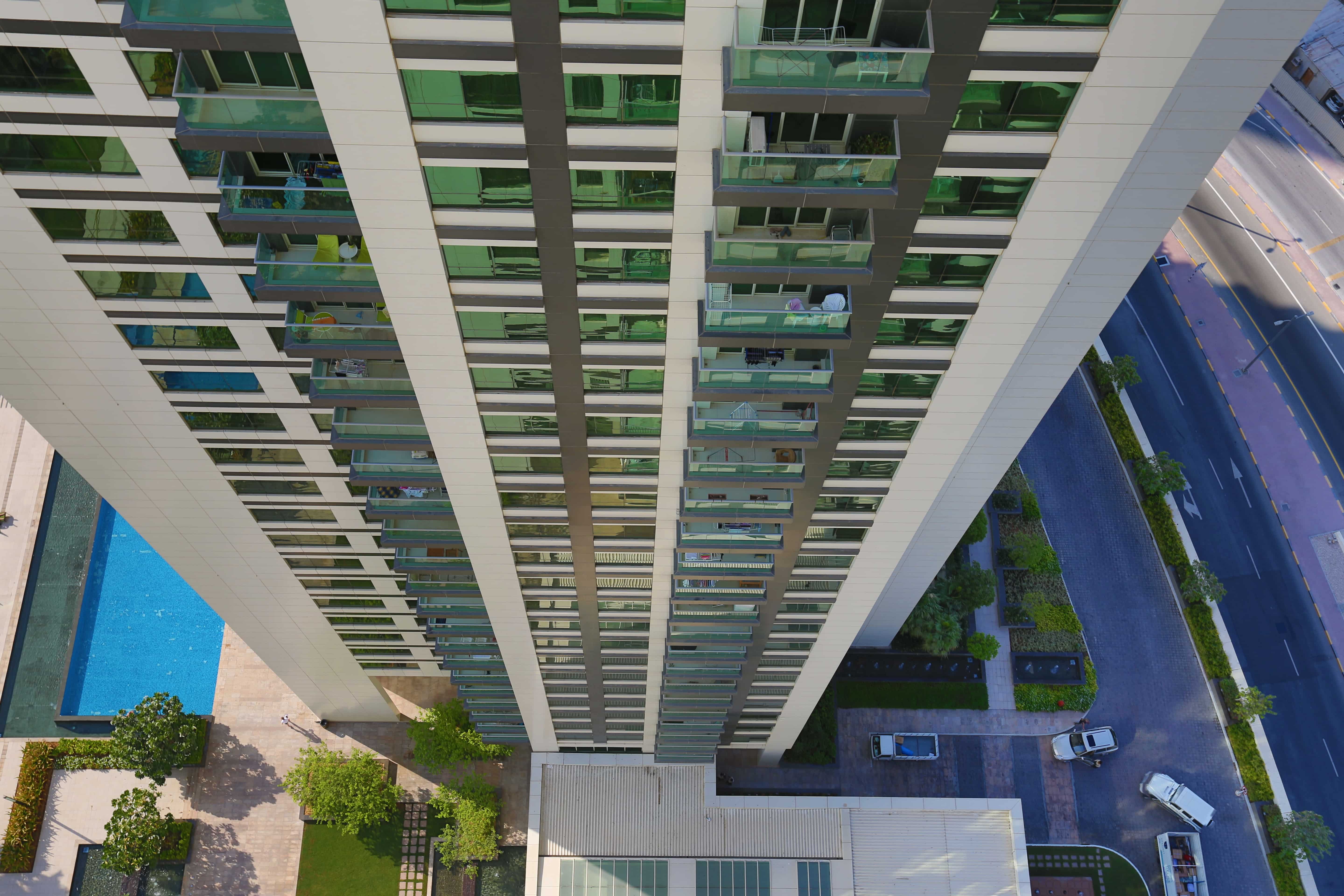 Aerial view of Burooj Views Marina Square, Al Reem Island, Abu Dhabi featuring waterfront surroundings, modern skyline, and residential community.