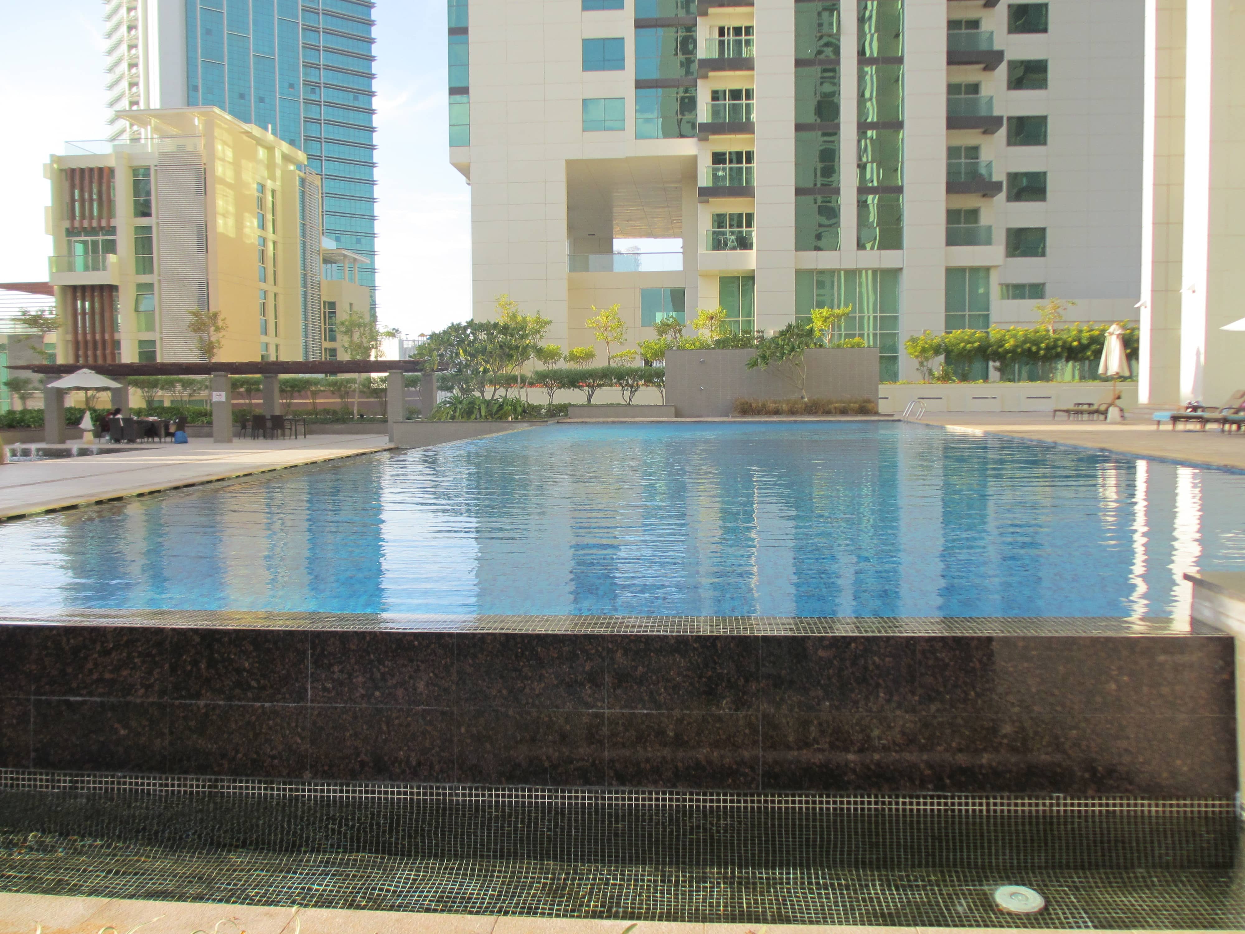 Marina Blue Tower exterior in Marina Square, Al Reem Island, Abu Dhabi highlighting luxury apartments and prestigious waterfront community.
