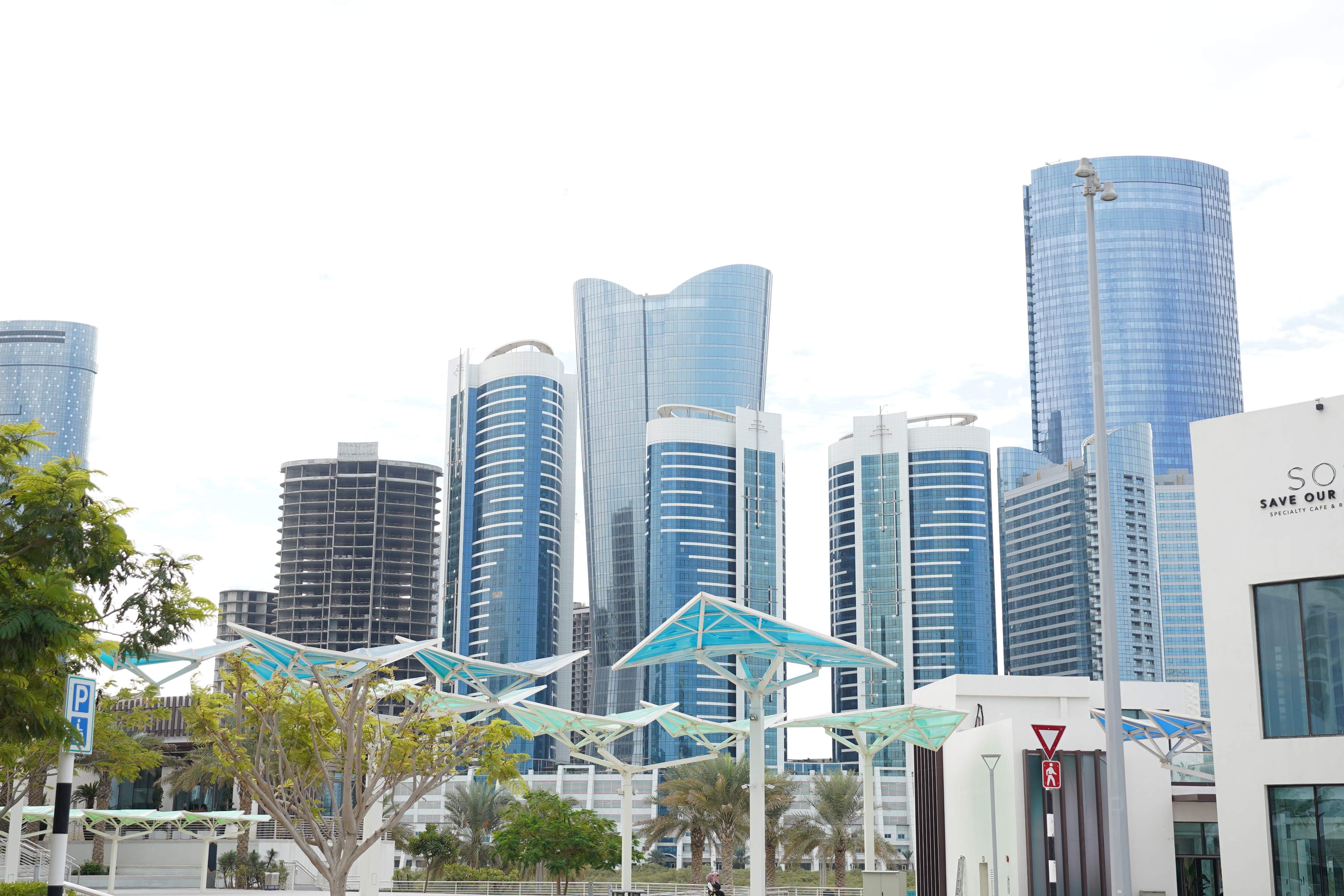 Sigma Tower Al Reem Island Abu Dhabi waterfront exterior view overlooking the Arabian Gulf and Abu Dhabi coastline