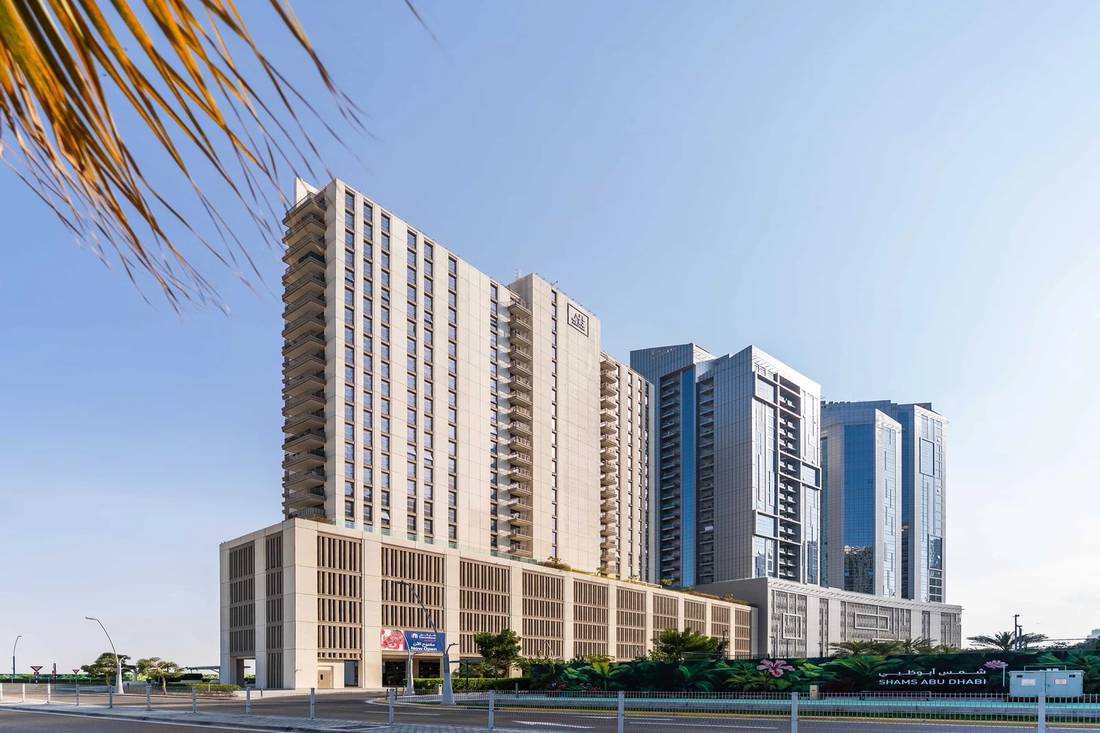 Reflection Tower modern glass façade in Al Reem Island Abu Dhabi with luxury urban living atmosphere