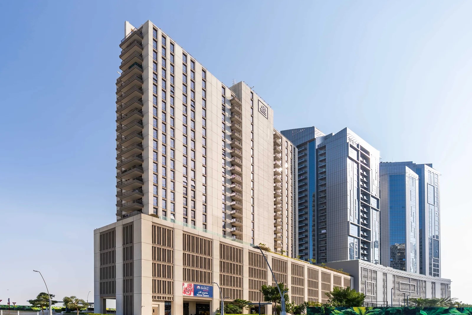 Reflection Tower twin towers façade at Al Reem Island Abu Dhabi featuring luxury apartments and contemporary glass design