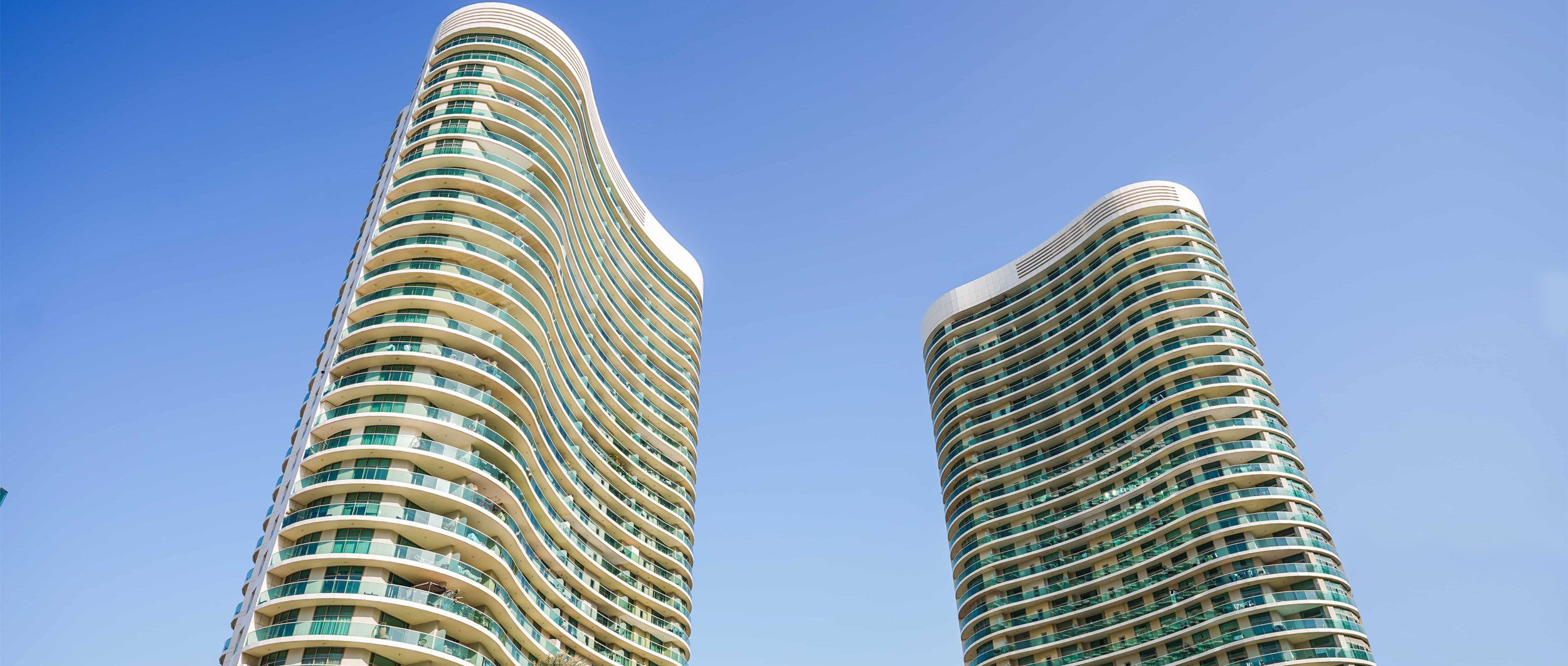 Beach Towers exterior on Al Reem Island, Abu Dhabi showcasing luxury waterfront apartments with contemporary high-rise residential architecture