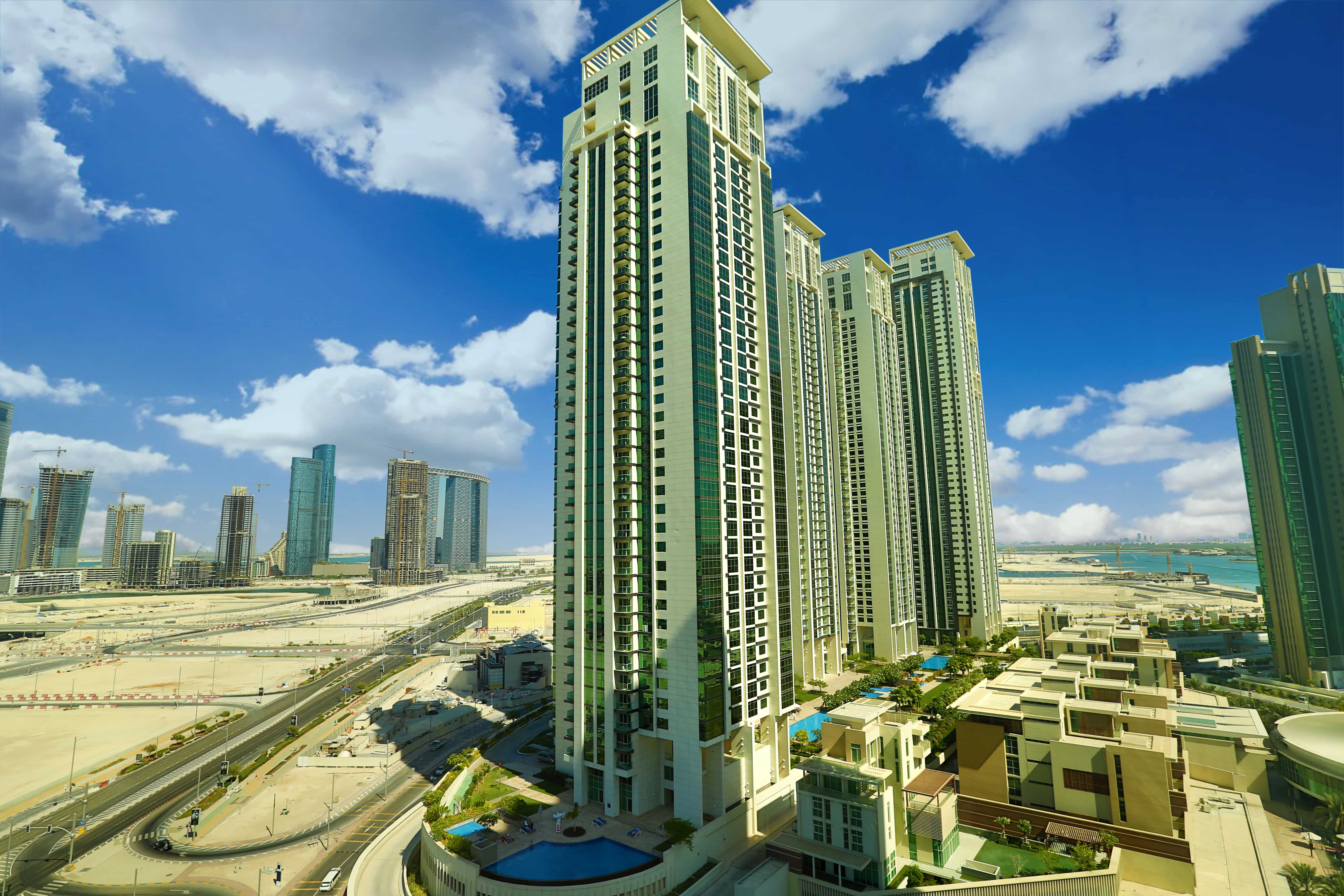 High-rise architecture of Ocean Terrace Tower Abu Dhabi overlooking the marina and Arabian Gulf.
