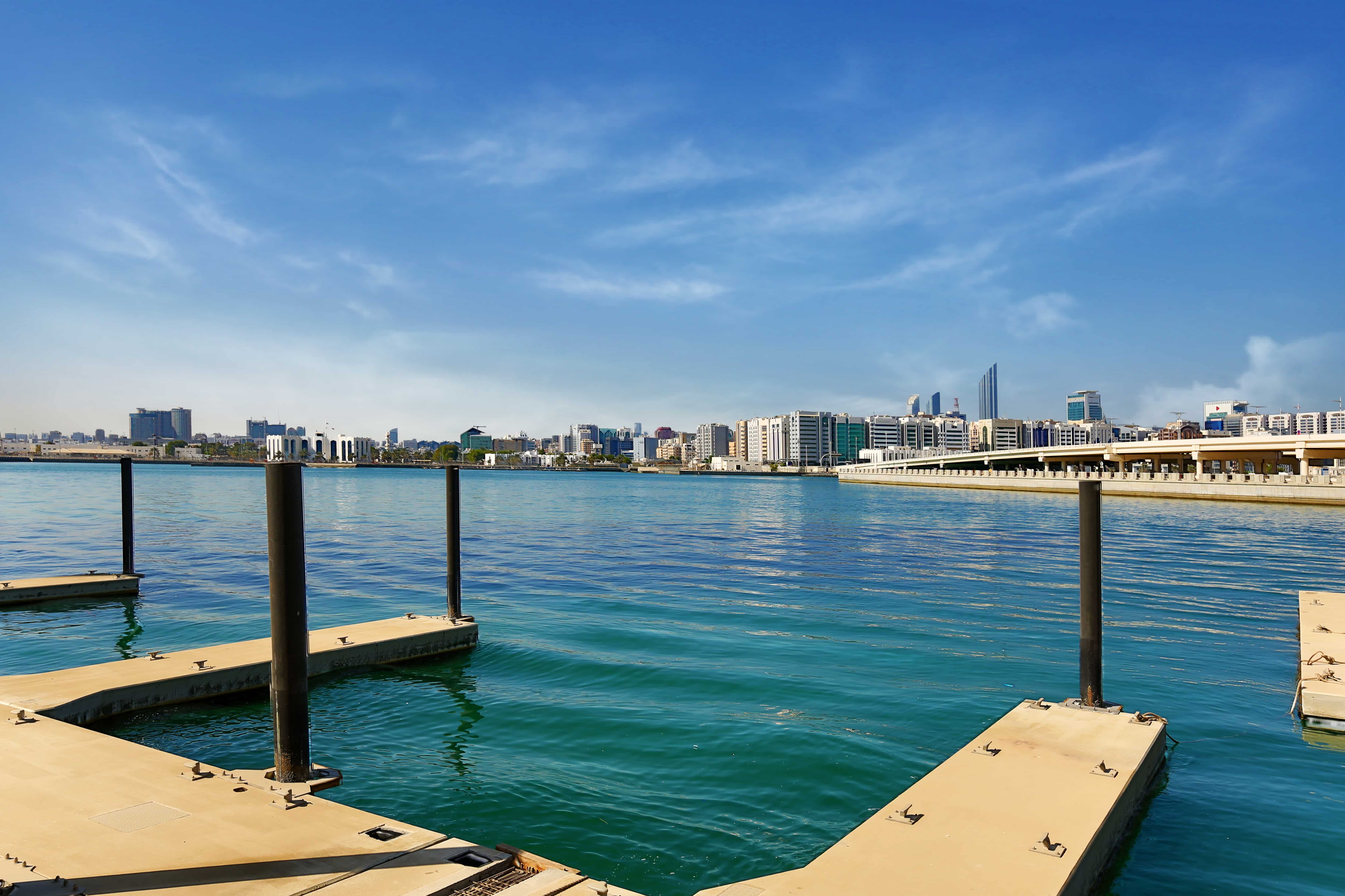 Ocean Terrace Tower surrounded by retail, cafes, and waterfront walkways in Marina Square Abu Dhabi